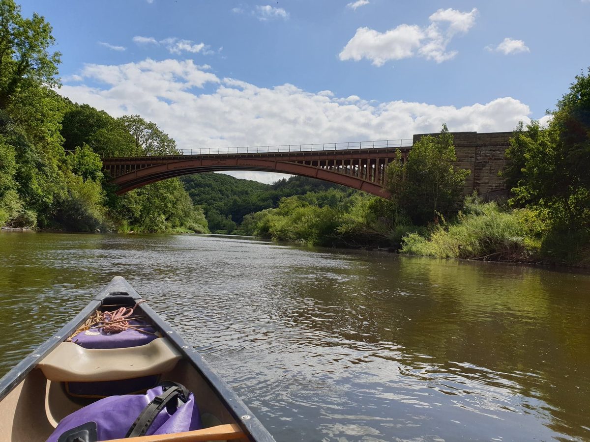 Stand-up paddleboarding on a calm stretch of the Severn
